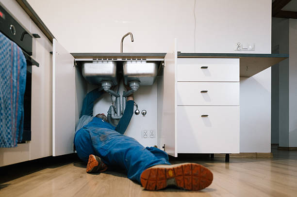 Professional Emergency Plumber technician working in Eagle Lake, FL
